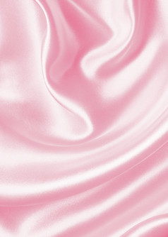光滑的优雅的粉红色的丝绸缎可以使用婚礼背景