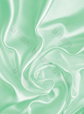 光滑的优雅的绿色丝绸缎可以使用背景