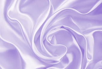 光滑的优雅的淡紫色丝绸缎可以使用背景