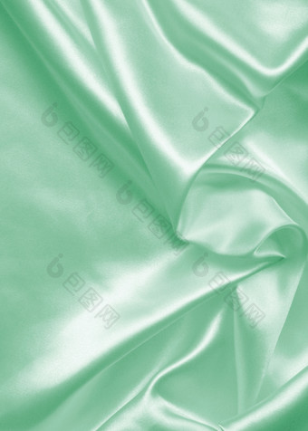 光滑的优雅的绿色丝<strong>绸缎</strong>可以使用背景
