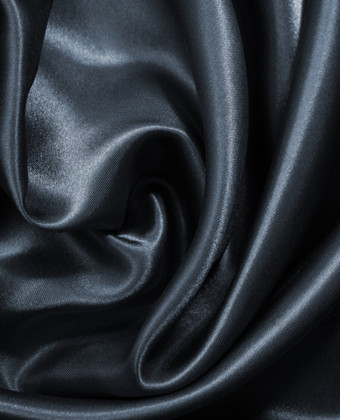 光滑的优雅的黑暗灰色丝绸缎可以使用背景