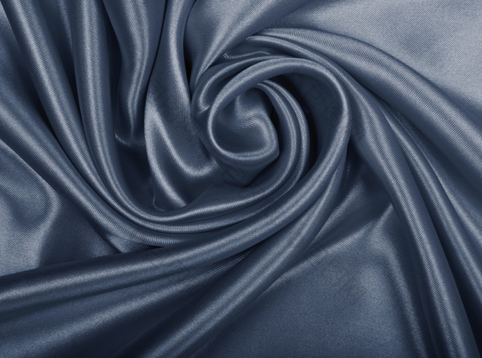 光滑的优雅的灰色丝绸缎可以使用背景