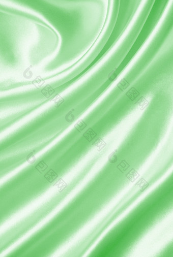 光滑的优雅的绿色丝<strong>绸缎</strong>纹理背景