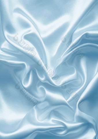 光滑的优雅的蓝色的丝绸缎纹理可以使用背景