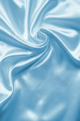 光滑的优雅的蓝色的丝<strong>绸缎</strong>可以使用背景