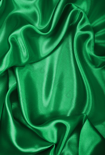 光滑的优雅的绿色丝绸缎纹理可以使用背景