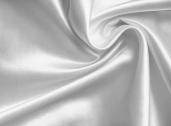 光滑的优雅的白色丝<strong>绸缎</strong>纹理可以使用婚礼背景
