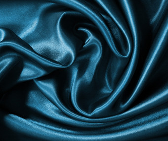 光滑的优雅的蓝色的丝<strong>绸缎</strong>可以使用背景