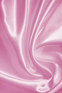 光滑的优雅的粉红色的丝绸缎纹理可以使用背景