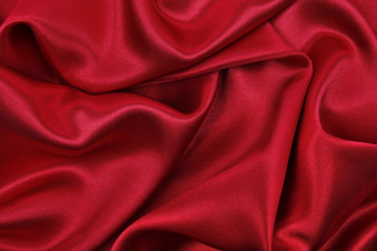 光滑的优雅的红色的丝绸缎奢侈品布纹理可以使用摘要背景豪华的情人节一天背景设计