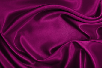 光滑的优雅的粉红色的丝绸缎奢侈品布纹理可以使用摘要背景豪华的情人节一天背景设计