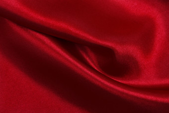 光滑的优雅的红色的丝绸缎奢侈品布纹理可以使用摘要背景豪华的情人节一天背景设计