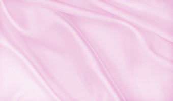 光滑的优雅的粉红色的丝绸缎纹理可以使用婚礼背景豪华的情人节一天背景设计