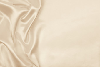 光滑的优雅的金丝绸缎奢侈品布纹理可以使用<strong>婚礼背景</strong>豪华的背景设计乌贼健美的复古的风格