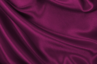 光滑的优雅的粉红色的丝绸缎奢侈品布纹理可以使用摘要背景豪华的情人节一天背景设计