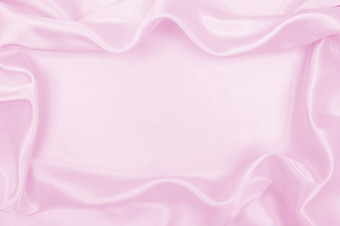 光滑的优雅的粉红色的丝绸缎纹理可以使用婚礼背景豪华的背景设计