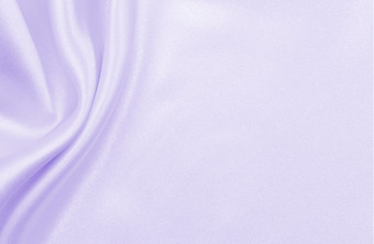 光滑的优雅的淡紫色丝绸缎纹理可以使用婚礼背景豪华的背景设计