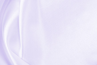 光滑的优雅的淡紫色丝<strong>绸缎</strong>纹理可以使用婚礼背景豪华的背景设计