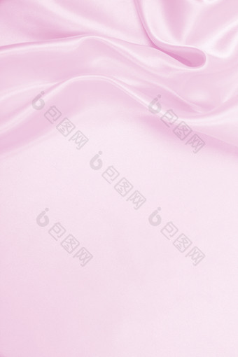 光滑的优雅的粉红色的丝<strong>绸缎</strong>纹理可以使用婚礼背景豪华的背景设计