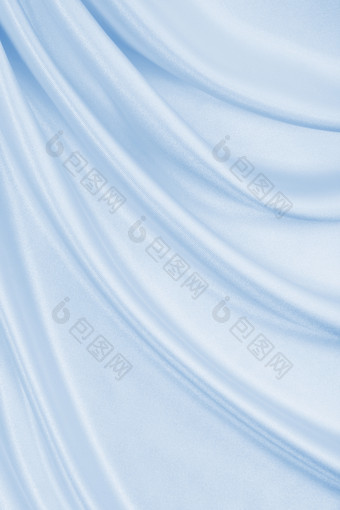 光滑的优雅的蓝色的丝绸缎奢侈品布纹理可以使用摘要背景豪华的背景设计