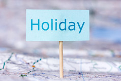 旅行假期概念地图与请注意关于假期