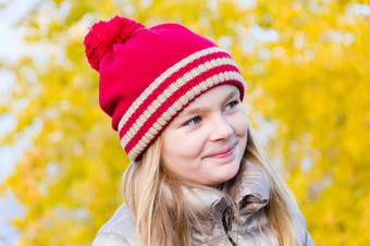 秋天照片美丽的女孩红色的帽子