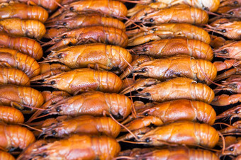 照片背景与红色的煮熟的小龙虾背景与许多小龙虾
