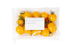 包装和标签黄色的樱桃西红柿孤立的白色背景