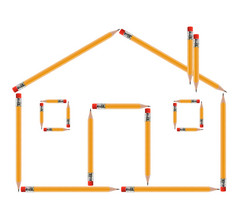 真正的房地产概念小房子使从小黄色的铅笔