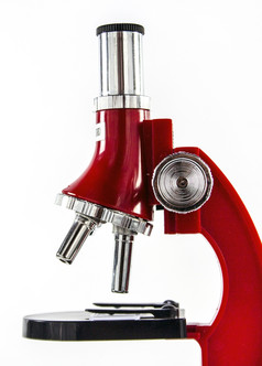 显微镜现代红色的显微镜孤立的白色背景