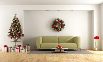 白色生活房间与圣诞节树白色生活房间与圣诞节树和绿色沙发呈现