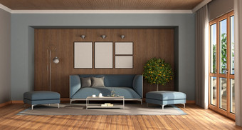 现代生活房间与优雅的蓝色的沙发和脚凳对木墙呈现现代生活房间与优雅的蓝色的沙发和脚凳