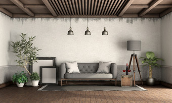 复古的风格生活房间与老墙木天花板和灰色的沙发呈现复古的风格生活房间与优雅的沙发