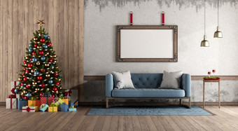 复古的风格生活房间与圣诞节树对木面板和蓝色的经典沙发呈现复古的风格生活房间与圣诞节树和礼物