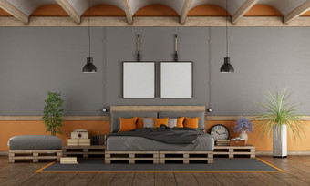 灰色的和橙色主卧室与托盘床上呈现主卧室与托盘床上