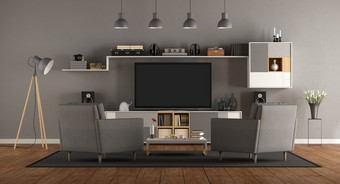 极简主义灰色的房间与首页电影系统和两个扶手椅呈现极简主义灰色的房间与首页电影系统