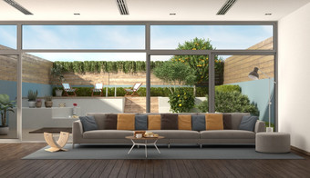 生活房间现代别墅与色彩斑斓的沙发和花园背景呈现生活房间现代别墅与花园背景