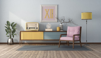 古董风格生活房间与柔和的颜色餐具柜和粉红色的扶手椅呈现古董风格生活房间与柔和的颜色