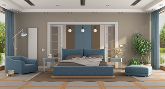 奢侈品蓝色的和棕色（的）主卧室与双床上扶手椅<strong>脚凳</strong>和dressroom背景呈现奢侈品蓝色的和棕色（的）主卧室