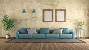 现代蓝色的沙发老房间与难看的东西墙呈现现代蓝色的沙发难看的东西房间