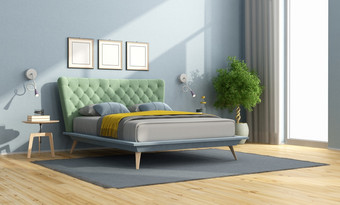 极简主义卧室与色彩斑斓的双床上蓝色的墙和windows-d呈现色彩斑斓的双床上极简主义卧室