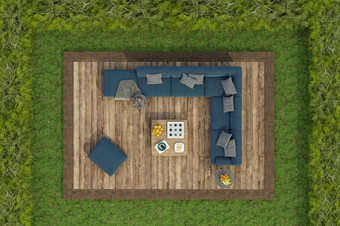 高角视图花园与蓝色的沙发<strong>脚凳</strong>和咖啡表格木甲板地板上草呈现高角视图花园与沙发木甲板地板上草