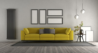 黄色的沙发极简主义室内与空白框架咖啡表格和垂直散热器呈现黄色的沙发极简主义室内