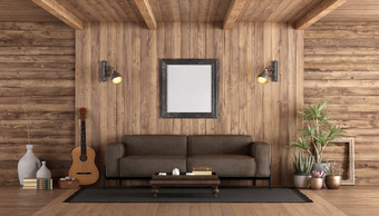 乡村风格木生活房间与棕色（的）沙发<strong>经典</strong>吉他和模型<strong>海报</strong>呈现乡村风格木生活房间与皮革沙发