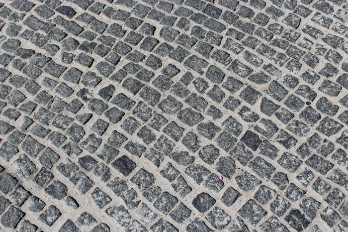 图像鹅卵石人行道上与灰色的模式