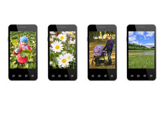 四个现代智能手机与彩色的图片孤立的的白色背景