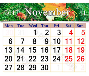 日历为11月与干叶云杉日历为11月与的丝带黄色的干叶的常绿云杉