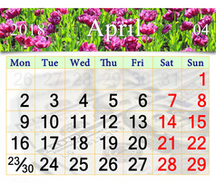 日历为4月与淡紫色郁金香日历为4月与花床上淡紫色郁金香