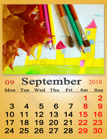 日历为9月与幼稚的图纸和叶子日历为9月与幼稚的图纸和黄色的枫木叶子