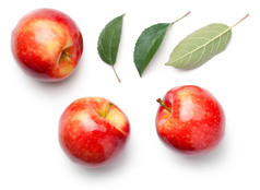 红色的苹果与叶子孤立的白色背景联欢晚会苹果前视图